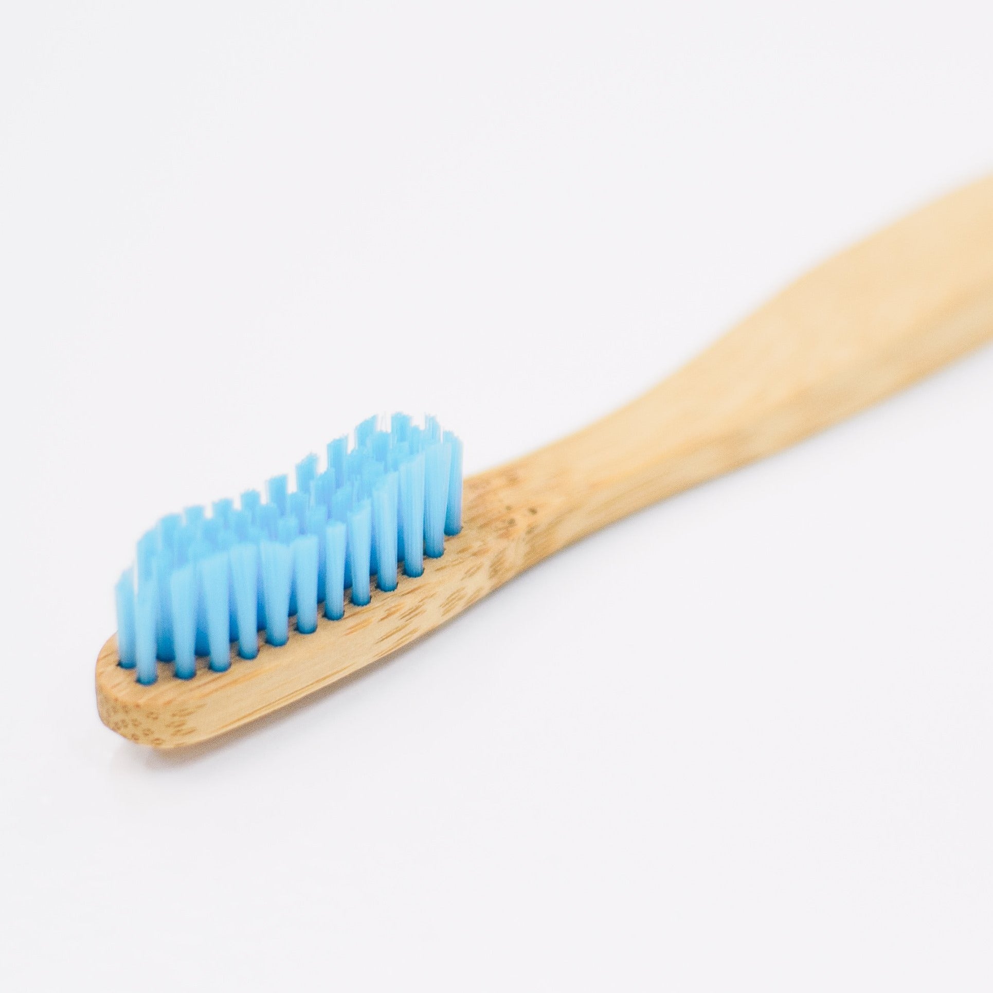 Bamboo toothbrush with medium stiffness bristles